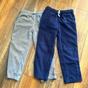 Set of two Carters fleece boys pants size 4. Minor wear and pilling.
